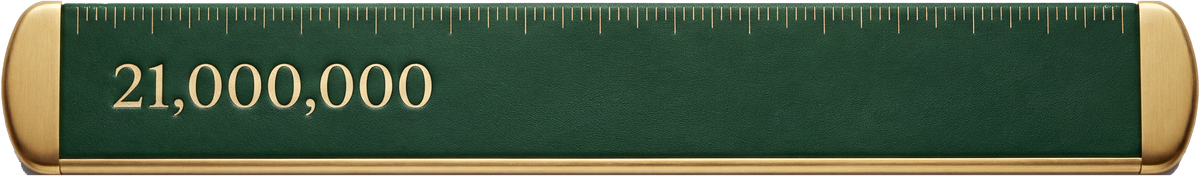 A British-racing-green enamel ruler with gold caps, engraved 21,000,000.